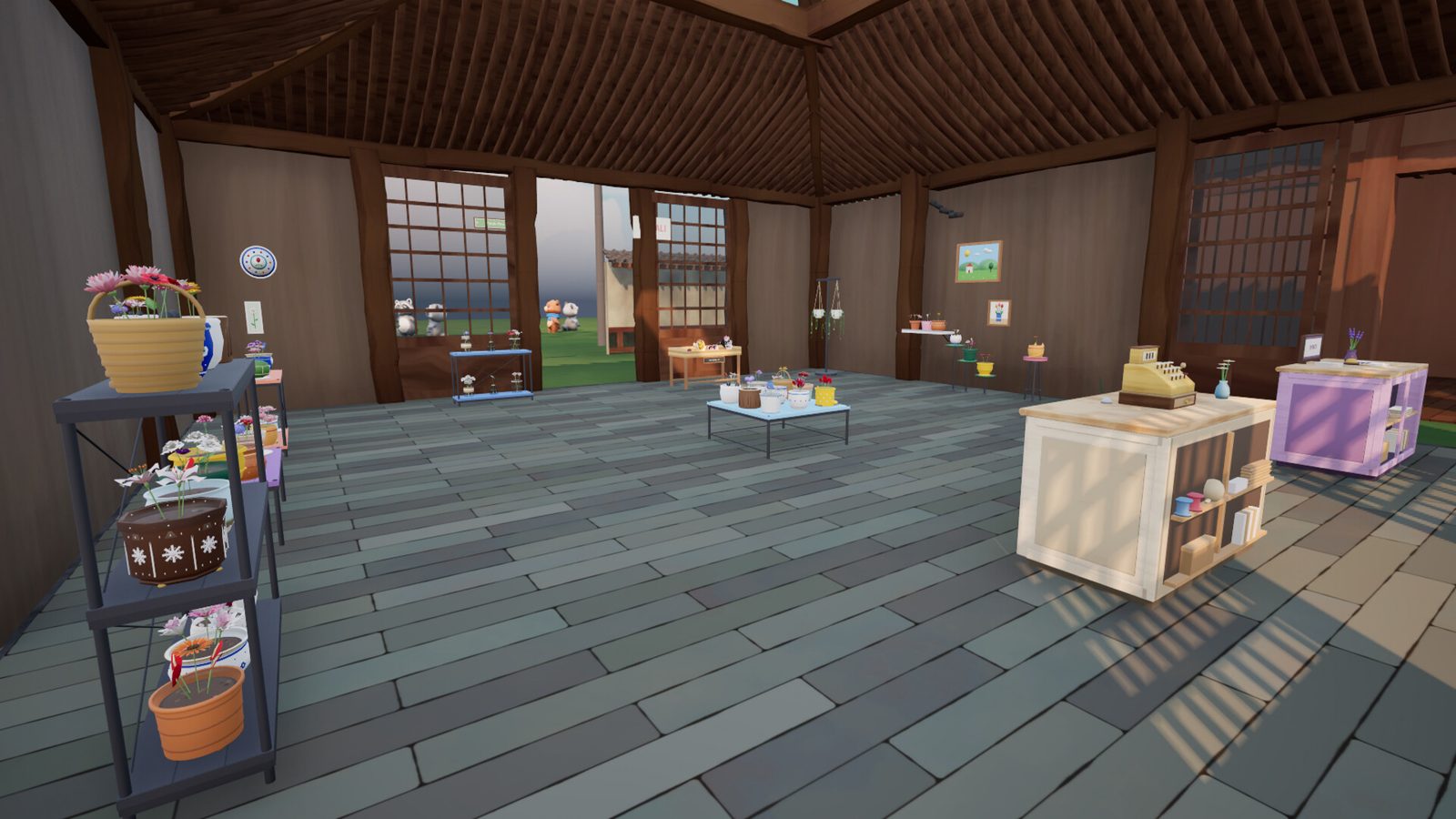 Inside the flower shop, with stocked shelves, display tables and the till